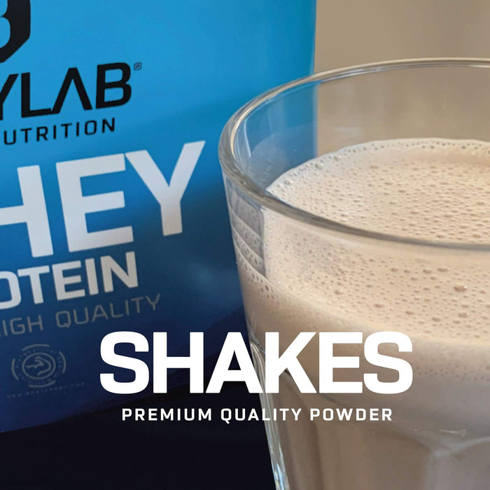 Proteinowy proszek Bodylab24 Whey Protein orzech kokosowy 2kg / kokos Proteinowy Shaker do sportów siłowych i fitness / proszek Whey może wspierać budowę mięśni/ proszek białkowy z 80% białkiem / bez aspartamu