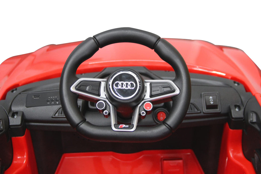 JAMARA 461806 Ride-on Audi R8 Spyder 18 V Einhell Power X-Change wraz z systemem startowym szybkiej wymiany akumulatorów, oficjalna licencja, Bluetooth, samochód elektryczny, czerwony