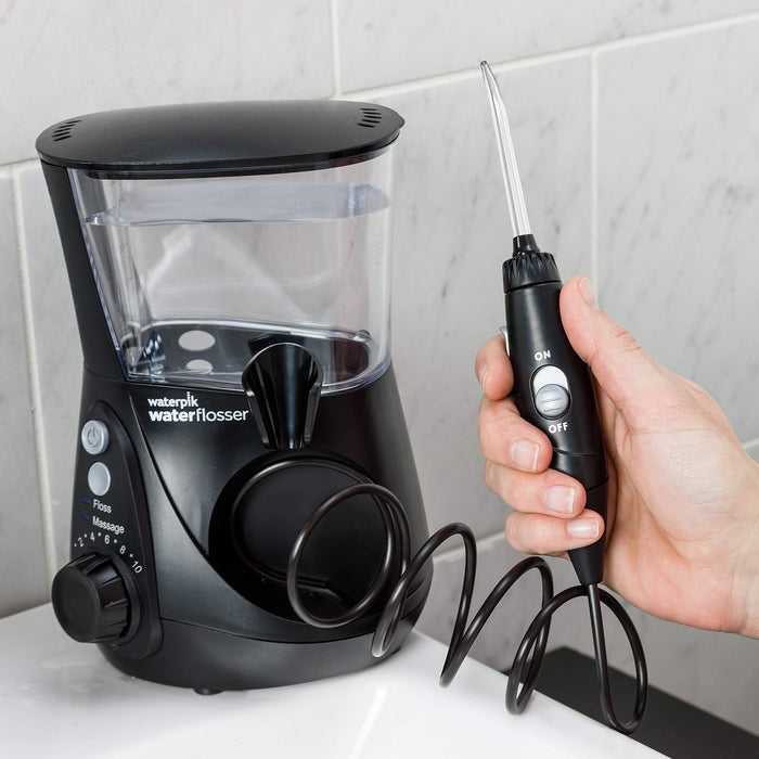 Waterpik Ultra Professional Waterflosser stały irygator do ust z 7 końcówkami, zakres ciśnienia od 0,7 do 7 bar regulowany za pomocą 10 ustawień ciśnienia, zintegrowany timer, czarny (WP-662EU)